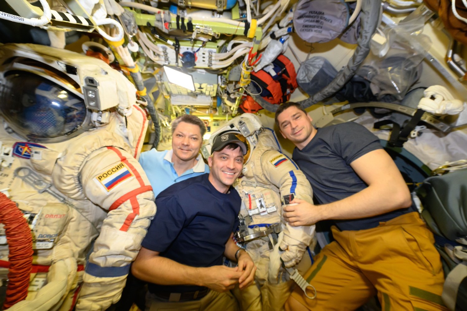 NASA astronaut Matthew Dominick with Oleg and Nokolai on the Orlan Lights and TV
